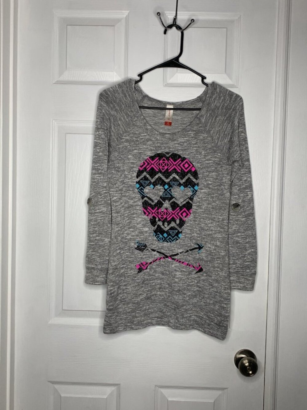 Vintage 2000’s Glittery skull sweater or mini dress if you dare!
